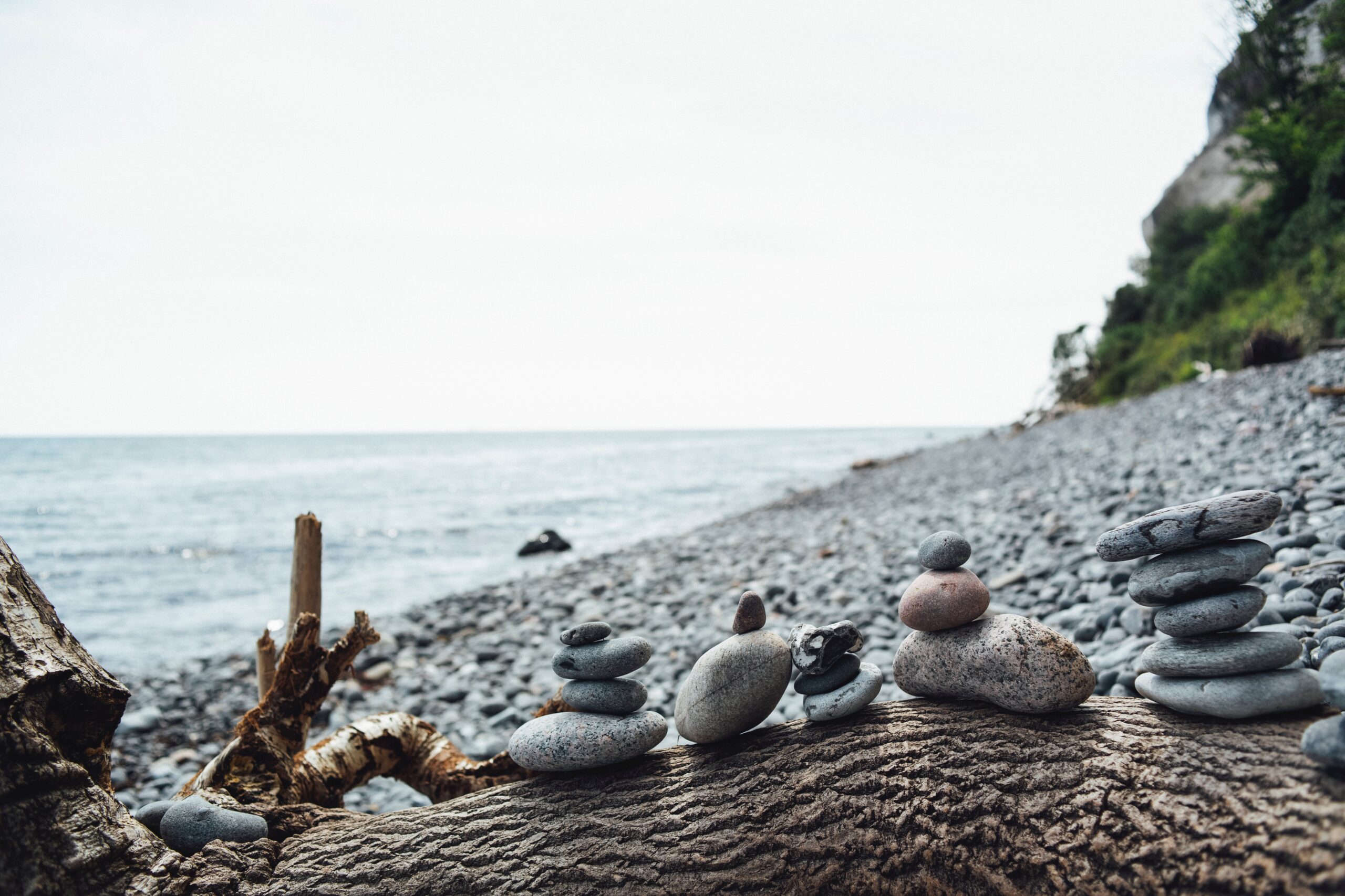 pebbles stacked on beach