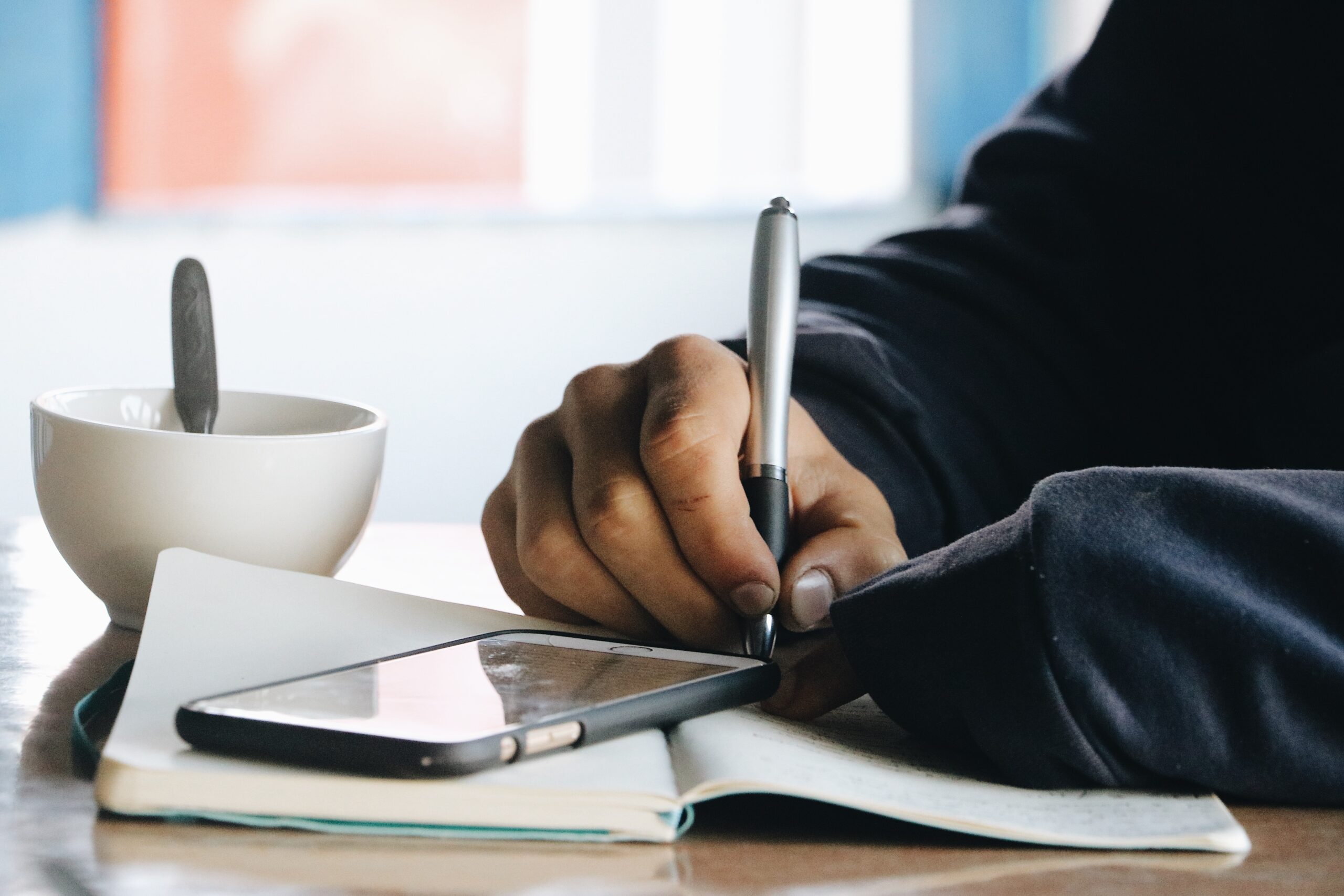 Man making written notes